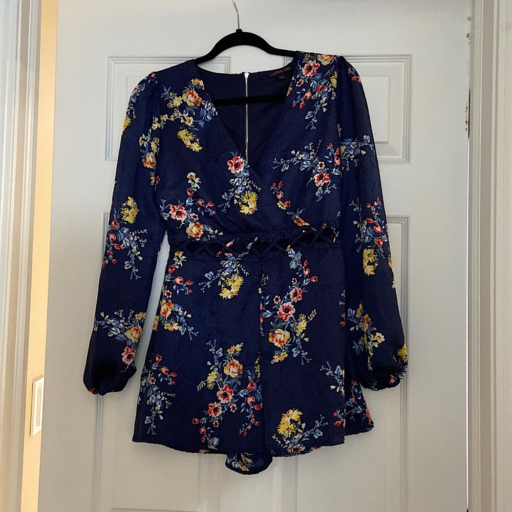 Long sleeved floral navy romper